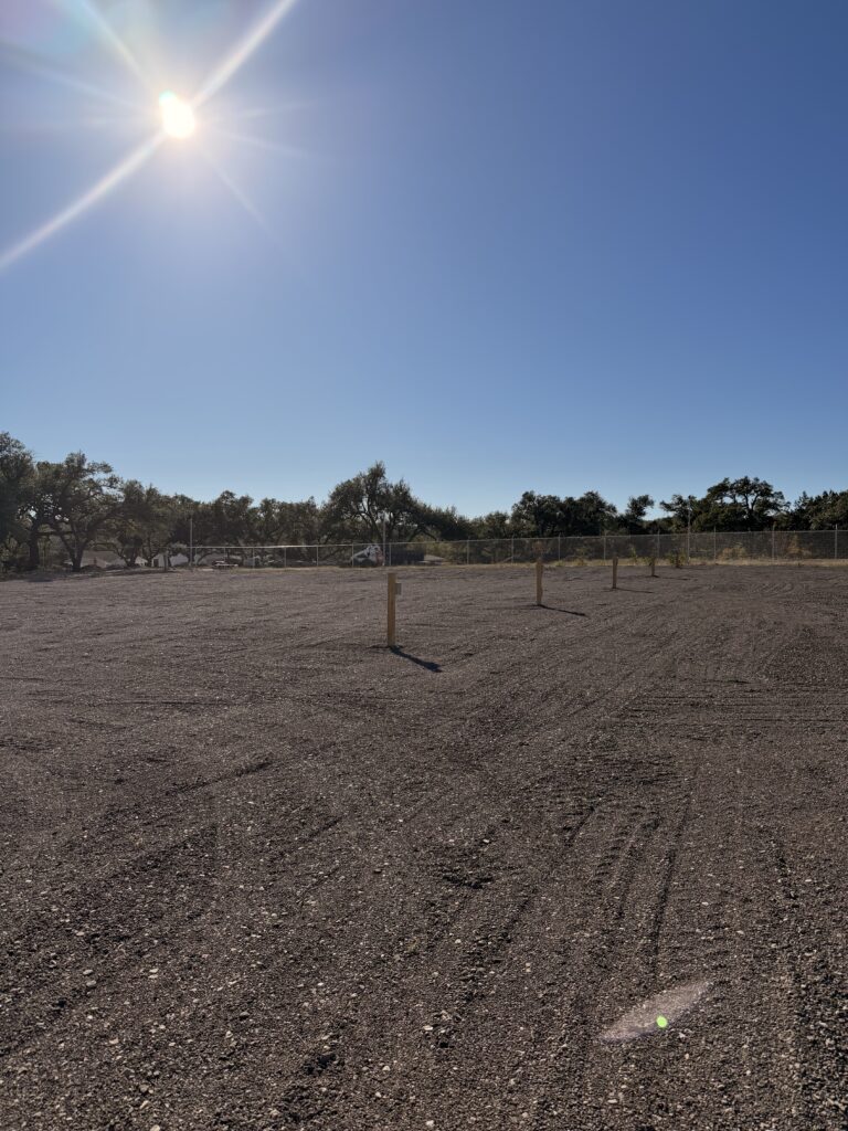 Open parking area for boat, RV and trailer storage in Dripping Springs, TX