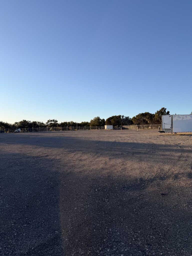 Open parking area for boat, RV and trailer storage in Dripping Springs, TX