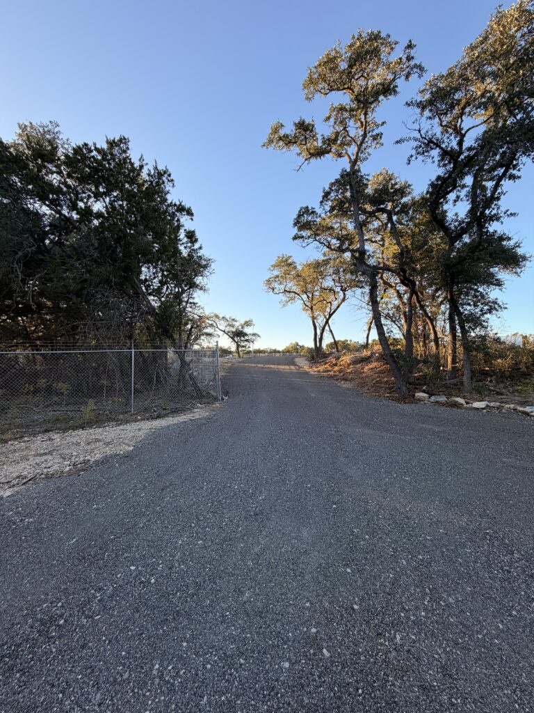 Security fencing and gate along the drive at Dripping Springs Self Storage